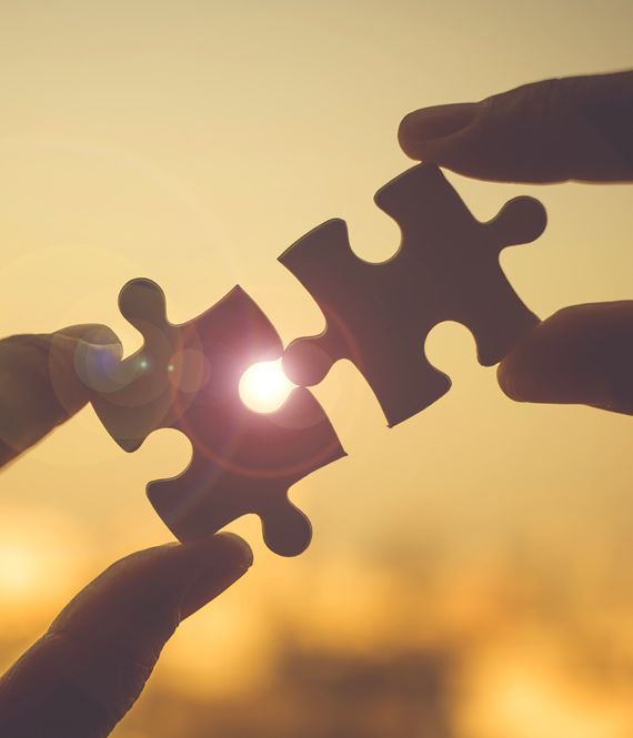 Puzzle pieces connecting